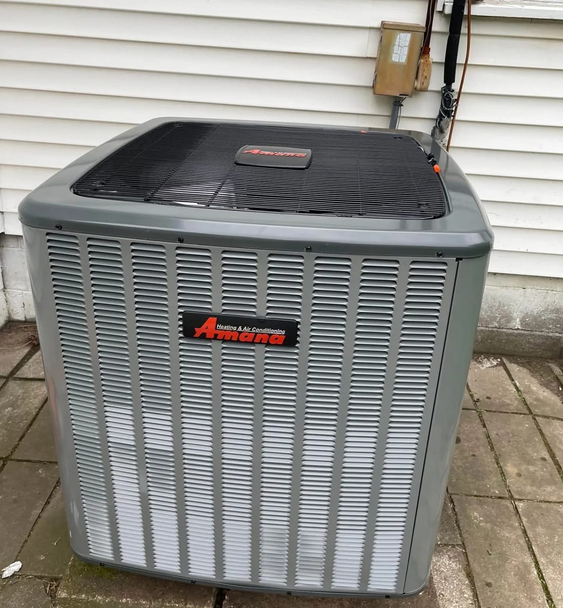 New Amana air conditioning condenser installed at a Tulsa home